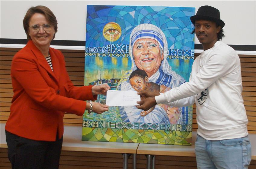 Ehemaliger Flüchtling Mulugeta Tekle malt Kanzlerin Angela Merkel als Mutter Teresa